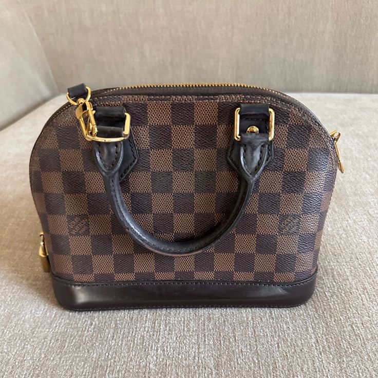 100% Authentic Louis Vuitton Alma Bb Bag, Can Be Worn Crossbody, On The Exterior Has Very Minimal Wear Marks, Only The Leather On The Handles And Inside Show Wear Marks. Alma Bb, Bags Louis Vuitton, Louis Vuitton Bags, Authentic Louis Vuitton, Louis Vuitton Bag, Handles, Bag Lady, Louis Vuitton, Exterior