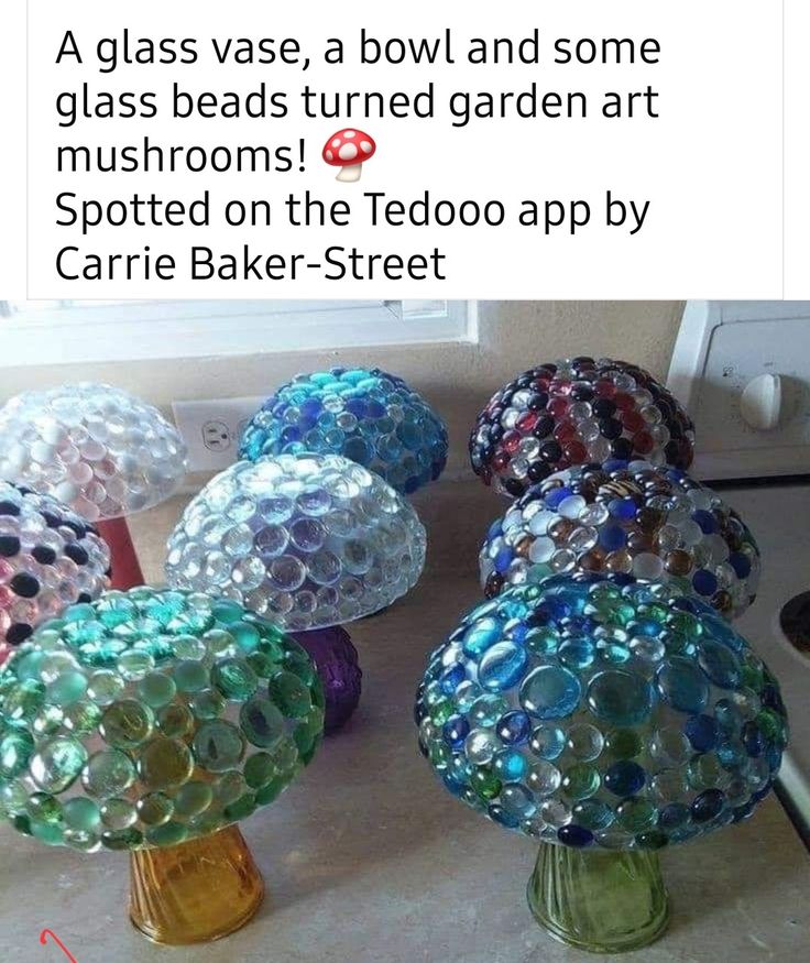 several glass vases sitting on top of a counter