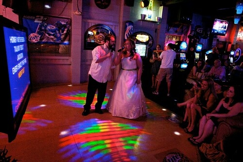 a bride and groom are dancing on the dance floor