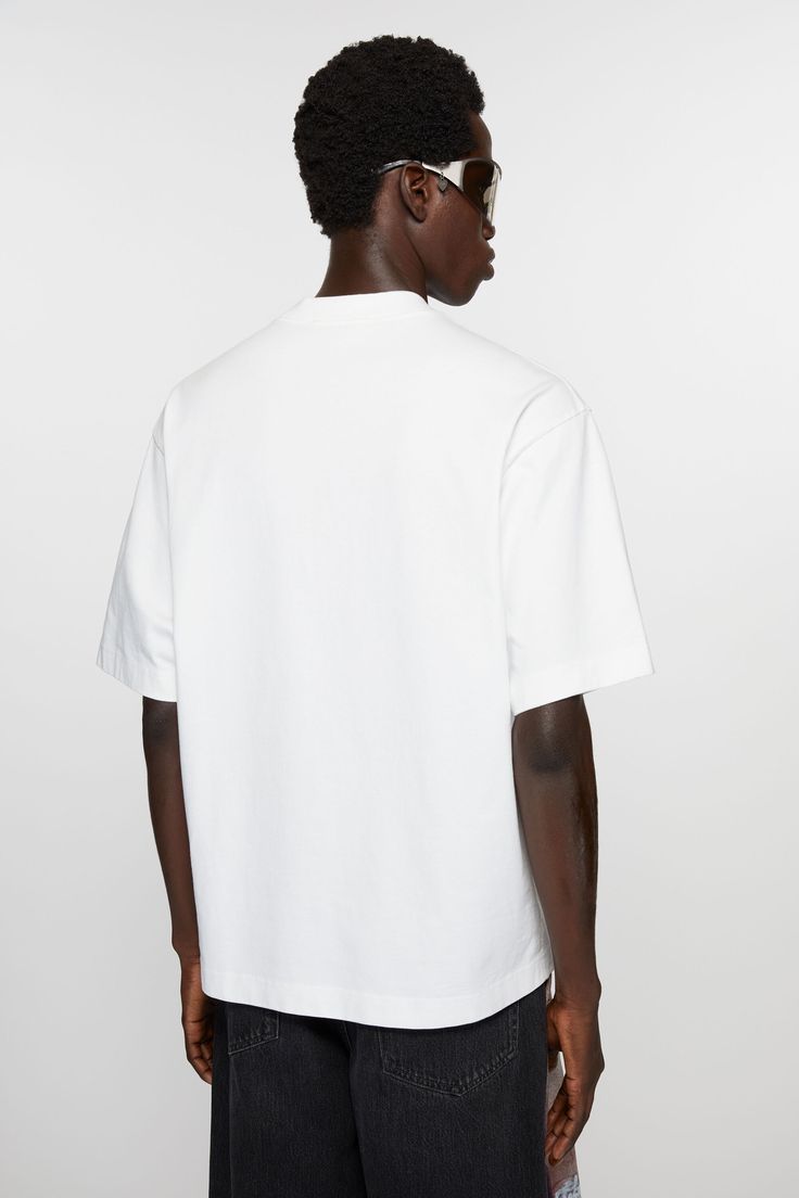 T-shirt is crafted from midweight jersey cotton and detailed with an Acne Studios logo on the centre front. Cut to a relaxed fit. Crew Neck T-shirt With Embroidered Logo For Streetwear, White Relaxed Fit T-shirt With Logo, Sporty Relaxed Fit T-shirt With Embroidered Logo, Sporty Relaxed Fit Cotton Jersey T-shirt, Casual Cotton T-shirt With Logo Detail, Logo Detail Short Sleeve T-shirt For Streetwear, Basic Relaxed Fit T-shirt With Logo Print, Classic Relaxed Fit T-shirt With Logo Print, Modern Short Sleeve T-shirt With Branding