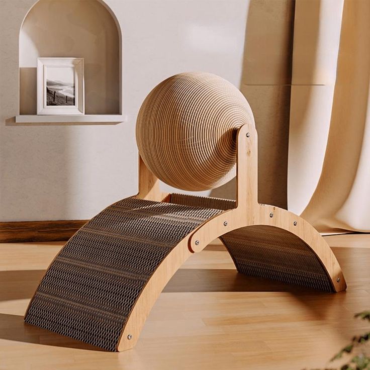 a wooden chair sitting on top of a hard wood floor