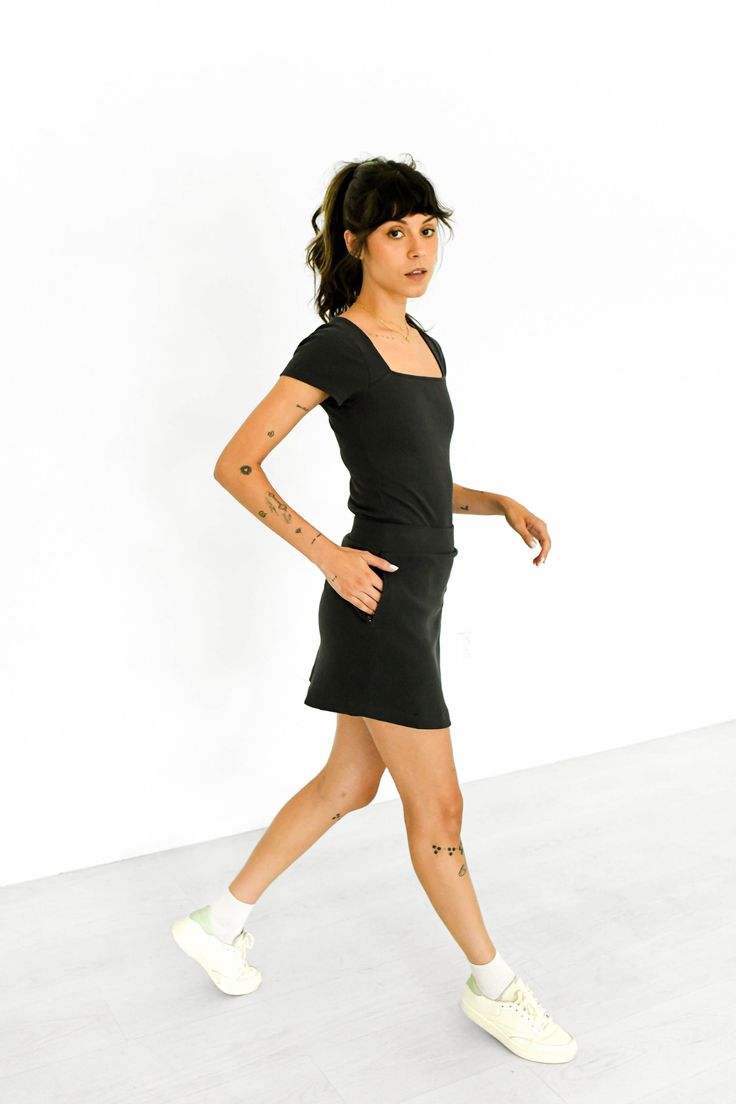 The go-to skort. Made from Peruvian cotton and full of functional surprises like hidden pockets, an elastic golf glove strap, and won't-fly-up fabric weight. Black Fitted Functional Skort, Functional Black Fitted Skort, Black Stretch Cotton Skort, Fitted Casual Skort With Side Pockets, Fitted Cotton Skort In Athleisure Style, Fitted Cotton Skort For Athleisure, Fitted Cotton Athleisure Skort, Cotton Athleisure Fitted Skort, Fitted Cotton Skort For Sports