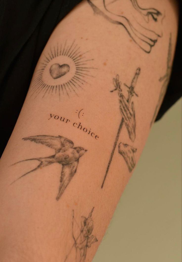 a person with a tattoo on their arm that says your choice and birds flying around