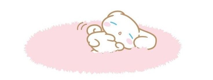 a small teddy bear laying down on top of a pink blanket with its eyes closed