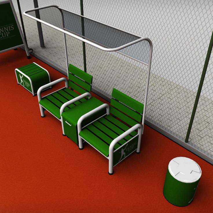 three green chairs sitting next to each other on a red carpeted floor in front of a fence