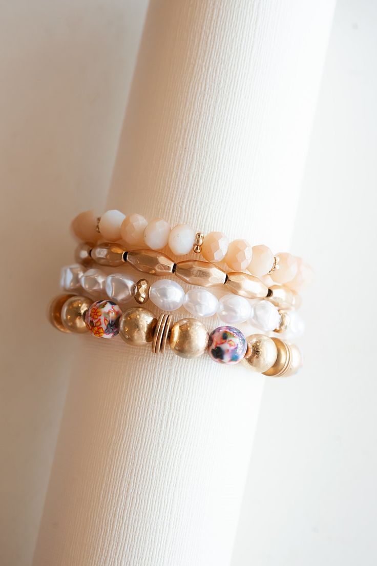 Elevate your wrist with the exquisite Lannie Blush and Gold Beaded Bracelet. This stunning accessory features a captivating combination of delicate pearls and dreamy watercolor-inspired beads, all adorned with elegant gold accents. The graceful interplay of textures and hues creates a timeless yet contemporary aesthetic that effortlessly enhances any ensemble. With its blend of sophistication and artistic charm, the Lannie bracelet is a versatile choice for those who appreciate the beauty of sub Dreamy Watercolor, Gold Beaded Bracelet, Bracelet Pearl, Gold Bead Bracelets, Blush And Gold, Contemporary Aesthetic, Lovely Jewellery, Bead Bracelet, Gold Beads