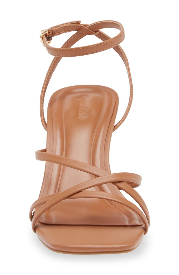 Complete your look with the breezy yet sophisticated style of a strappy sandal lifted by a just-right heel. 2 1/2" heel Adjustable ankle strap with buckle closure; hidden elastic inset Synthetic upper and lining/rubber sole Imported Strappy Sandals With Padded Heel, Medium Width, Strappy Sandals With Padded Heel And Medium Width, Chic Brown Heels With Adjustable Strap, Medium Width Strappy Heels With Heel Loop, Strappy Sandals With Wrapped Heel, Medium Width, Strappy Sandals With Removable Insole And Medium Width, High Heel Sandals With Adjustable Strap, Medium Width, Medium Width Strap Sandals With Block Heel, Medium Width Strappy Sandals With Heel Strap