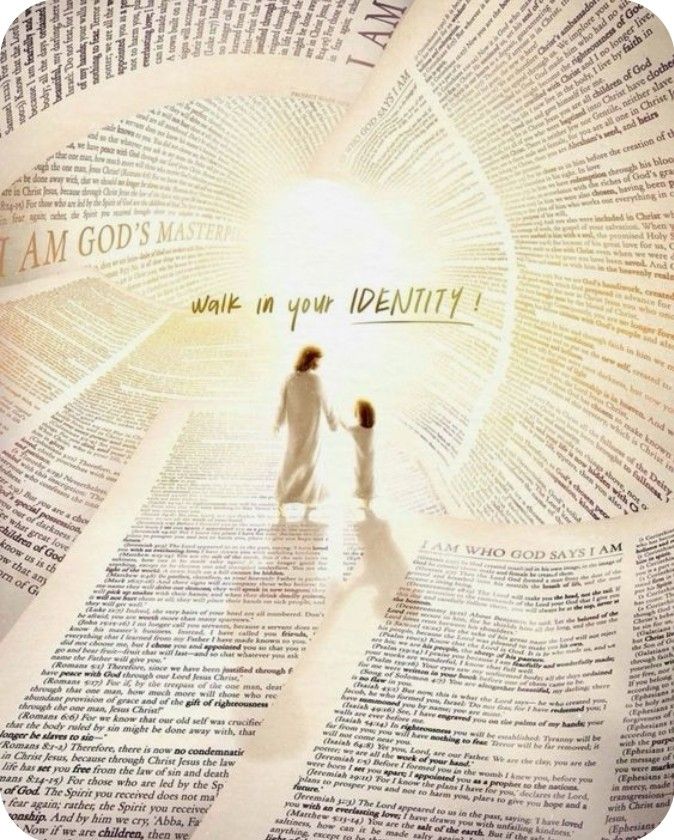 two people holding hands in front of a large poster with words all over it that read i am god's master, wake in your identity