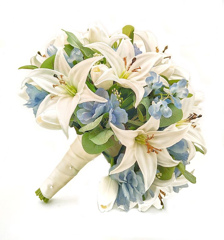 a bridal bouquet with blue and white flowers on it's side is photographed against a white background