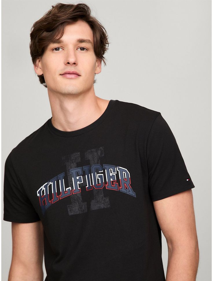 Tommy Hilfiger men's T-shirt. Made from lightweight cotton jersey, known for its breathability and stretch, our comfortable crewneck tee is cut in an easy fit and finished with our Hilfiger graphic.  Material: 100% Cotton. Tommy Hilfiger Graphic Tee For Summer, Tommy Hilfiger Graphic Tee With Crew Neck, Tommy Hilfiger Graphic Tee With Short Sleeves, Tommy Hilfiger T Shirt Men, Tommy Hilfiger Graphic Tee With Graphic Print, Sporty Tommy Hilfiger Tops With Graphic Print, Tommy Hilfiger Sporty T-shirt For Summer, Tommy Hilfiger Summer Graphic Tee, Tommy Hilfiger Graphic Tee For Streetwear