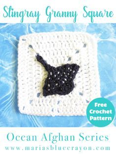 a crocheted square with a black cat on it's side in the water