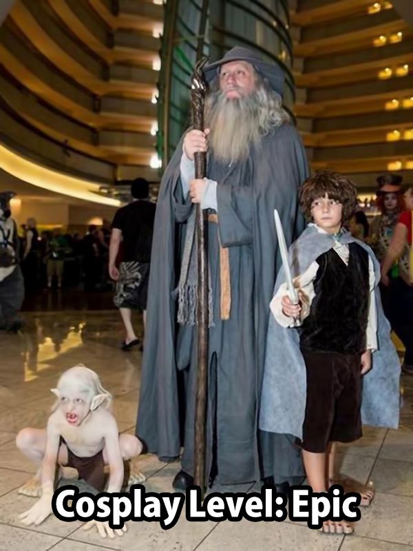 two children and an old man in costume