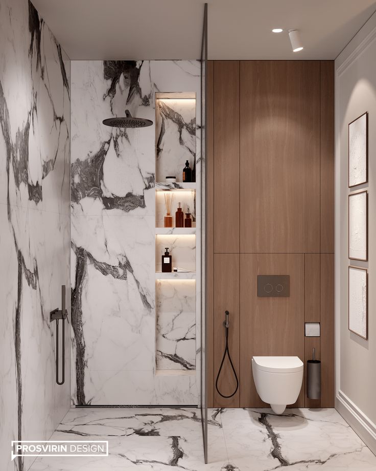 a bathroom with marble walls and flooring next to a white toilet sitting on top of a wooden shelf