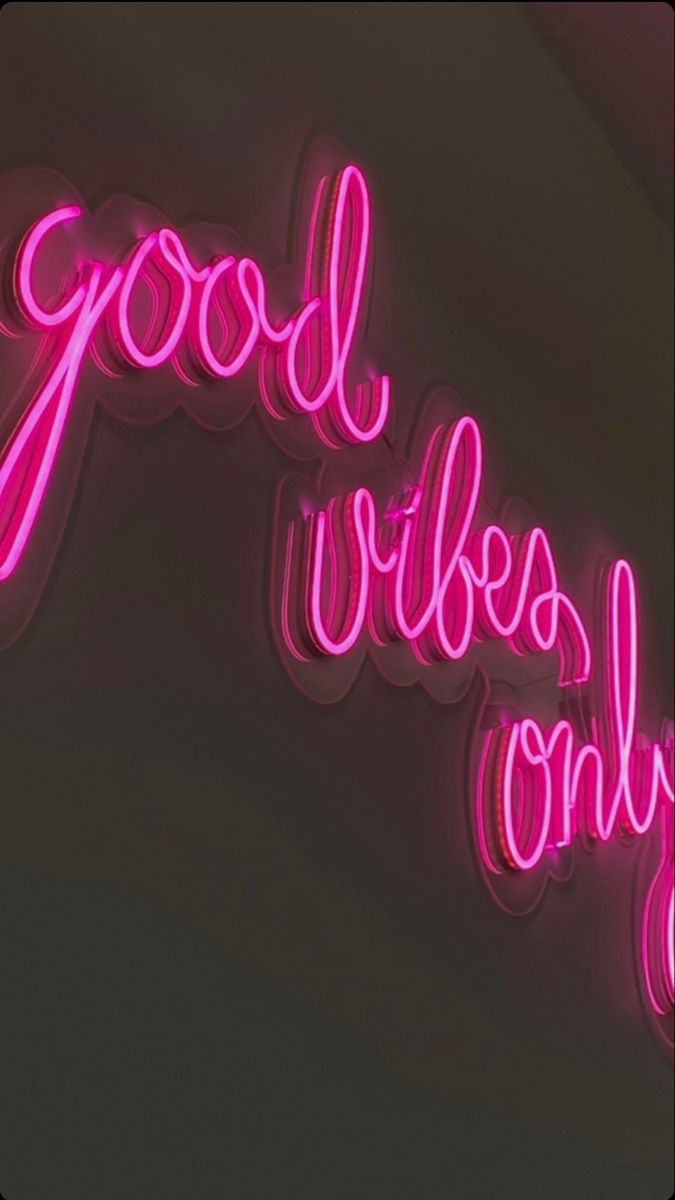 a neon sign that says good vibes only