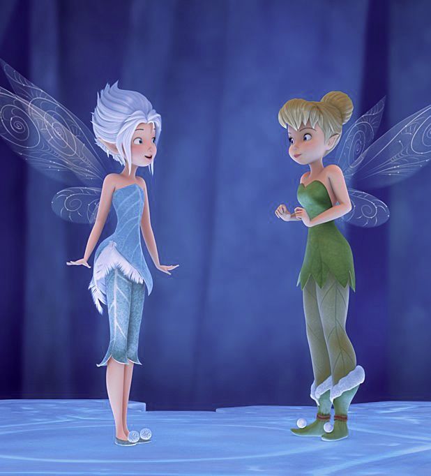 two cartoon characters dressed as tinkerbells standing in front of a blue background