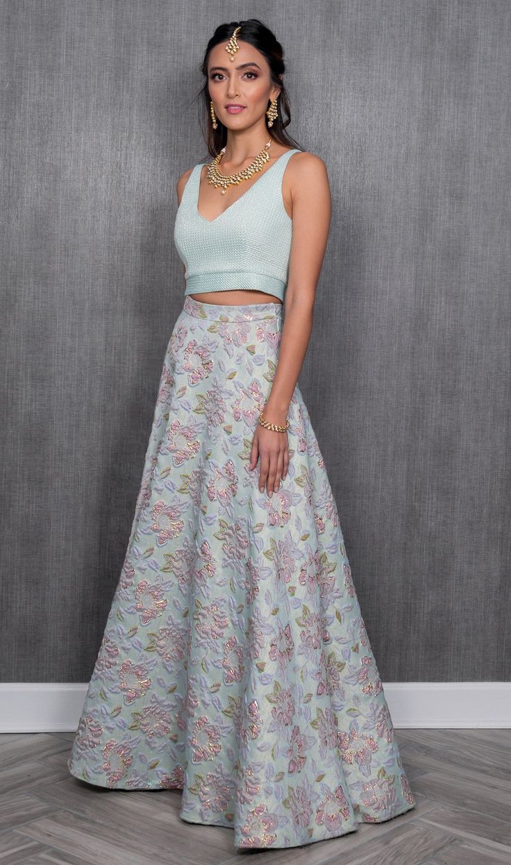 Lehenga fit for a Grande Personality. A high waisted skirt with a gorgeous floral pattern throughout. Designed in cool pastels, style this jacquard skirt with a crop top and dupatta for a South Asian wedding weekend! Perfect for a wedding guest outfit. Pictured with the NADIA Top. Estimated Delivery : This product is made to order. Please allow 2 - 6 weeks for your product to be produced and shipped. Need it sooner than the estimated delivery? Don't see your size available? Email us to inquire. Floral Jacquard Skirt Outfit, Fitted Lengha Skirts, High Waist Lehenga, Pastel Saree Wedding Guest, Wedding Skirt And Top Guest, Sangeet Outfit Ideas For Guests, Lenghas For Wedding Guests, Sangeet Outfit Women, Asian Wedding Guest Outfit