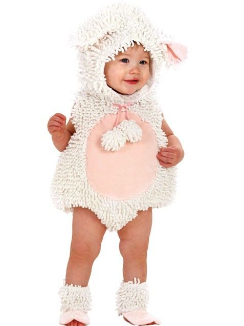 a baby dressed in a sheep costume