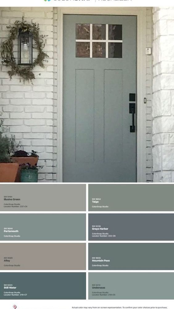 the front door is painted gray and white