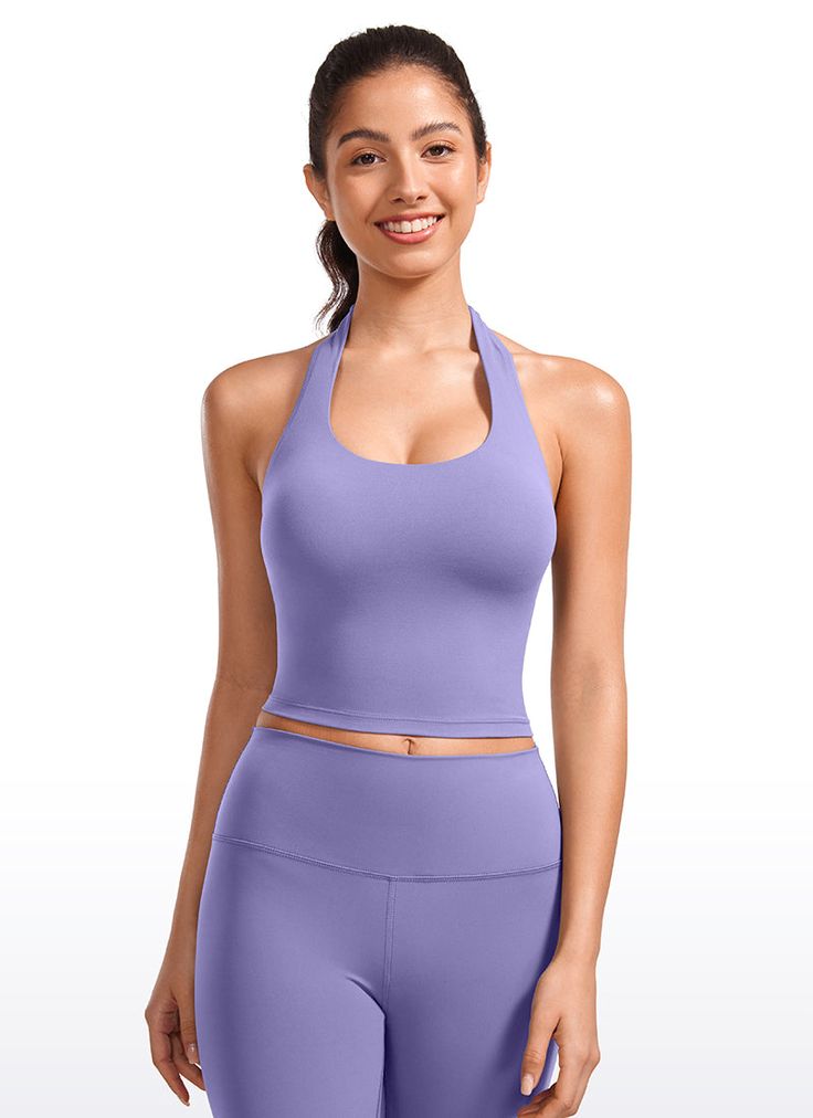 Butterluxe collection features super softness and stretch. Longline style offers coverage, while V-collar can show your charming neck line. Feature & Fitting: 
 Butterluxe collection 
 Design for yoga 
 
 Scoop neck design 
 Halter backless sports bras for back exercise 
 Built-in shelf bra with removable pads 
 Fabric: 
 Extremely Soft, luxurious comfort and lightweight 
 Ultra stretchy, very gentle compression 
 Brushed, 4-Way stretch 
 81% Polyamide, 19% Lycra Fitted Yoga Top With Built-in Padding, High Stretch Tops With Built-in Padding For Pilates, High Stretch T-back Tops For Sports, Solid Tops With Built-in Padding And 4-way Stretch, Fitted T-back Activewear For Yoga, Solid T-back Top Bra Friendly, Solid T-back Top That Is Bra Friendly, Halter Neck High Stretch Tank Top For Yoga, Halter Neck Stretch Top For Yoga