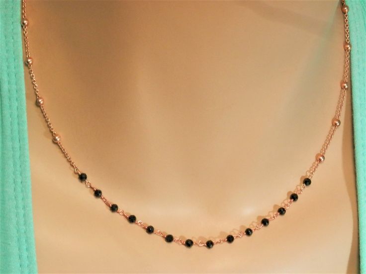 delicate rose gold choker necklace gold chain necklace dainty gold choker gold chain choker black necklace spinel rosary satellite necklace This is a gorgeous necklace that can be worn everyday or on special occasions! This necklace has two parts: the satellite chain necklace part and the black spinel rosary bar /part. This chain rosary necklace is available in gold and rose gold finish! Black spinel stones are tiny and faceted which give a sparkling touch to your look! A beautiful satellite and Dainty Double Strand Rose Gold Jewelry, Rose Gold Double Strand Jewelry With Delicate Chain, Dainty Rose Gold Jewelry With Beaded Chain, Dainty Rose Gold Jewelry With Tiny Beads, Rose Gold Jewelry With Tiny Beads For Gift, Elegant Rose Gold Jewelry With Satellite Chain, Satellite Chain Choker As Gift, Elegant Black Jewelry With Satellite Chain, Elegant Tiny Beads Choker Jewelry