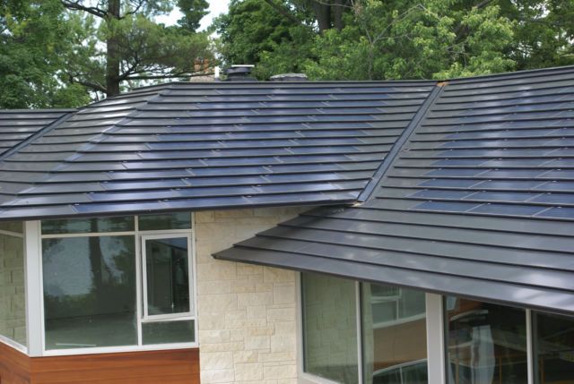 the roof of a house with solar panels on it