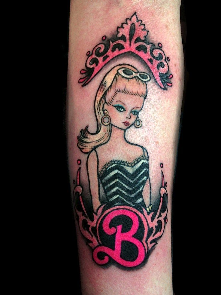 Barbie Tattoos | Inked Magazine Barbie Tattoo Ideas, Barbie Tattoo, Barbie Ponytail, C Tattoo, Valentines Gift Bags, Spooky Tattoos, Detailed Tattoo, Pin Up Tattoos, Tattoo Designs For Girls