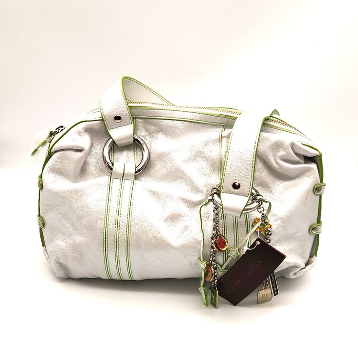 Soft White Pearlized Leather. Branded On All Hardware. Hardware Is Chrome Toned. Strap Drop Is 10". Green Trim Is Subtly Placed In Stitching And Edges Of Leather Straps. She Does Have One Small Imperfection Which Is Shown In Photo. She's A Beauty! White Hobo Bag With Double Handle, White Shoulder Bag With Silver-tone Hardware And Double Handle, White Satchel With Leather Handles, Designer White Satchel With Leather Handles, Designer White Hobo Bag, Designer White Hobo Bag For Daily Use, White Tote Shoulder Bag With Silver-tone Hardware, White Bags With Silver-tone Hardware And Double Handle, White Top Handle Hobo Bag