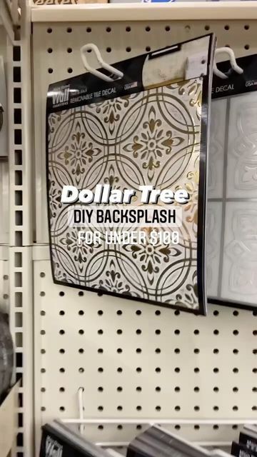 the dollar tree diy backsplash sign is hanging on the wall in the store