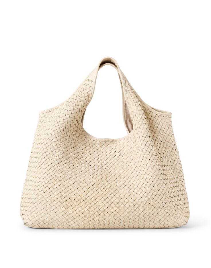 This ivory bag from Laggo is the perfect carryall. Large enough to hold all your essentials, it's woven leather is lined with cotton canvas for durability and style. Versatile for everyday use, wear this bag with a pair of jeans and a light top to polish off all your warm weather ensemble. Natural Woven Leather Top Handle Bag, Intrecciato Weave Rectangular Hobo Bag For Travel, Rectangular Intrecciato Hobo Bag For Travel, Beige Top Handle Bag With Woven Leather, Leather Straw Bag With Rolled Handles For Travel, Luxury Woven Cream Shoulder Bag, Beige Woven Leather Satchel Bag, Modern Woven Leather Hobo Bag For Daily Use, Luxury Woven Leather Straw Bag For Everyday