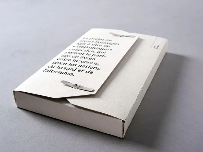 an open book with a tag attached to it