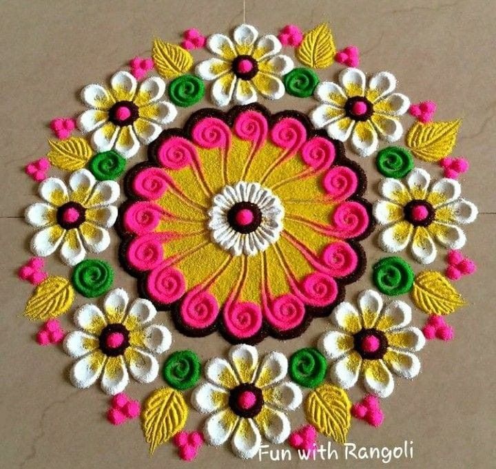 this is an image of a colorful flower design on the wall or floor with white, yellow and pink flowers