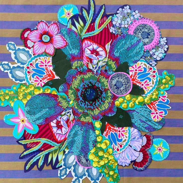 an image of a colorful flower arrangement made out of cloths on a striped background