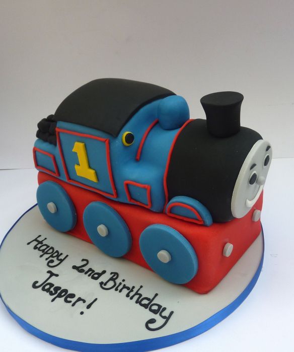 a birthday cake with a thomas the train on it