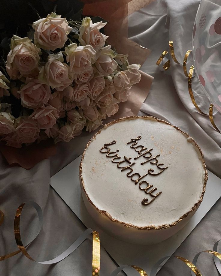 a birthday cake with the words happy birthday written on it