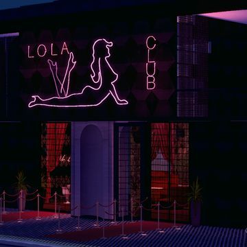 a neon sign that reads lollapopo club on the side of a building