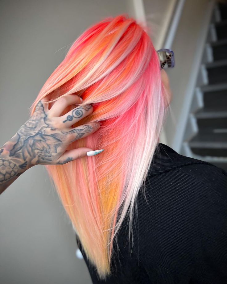 Image description: The back of a person's head, they have neon pink, orange, and yellow hair with white blonde pieces. Hot Pink And Pastel Pink Hair, Unique Hair Dye Ideas Color Trends, Pink Halo Hair Blonde, Fun Hair Colors For Blondes, Blonde With Vivid Color, Bold Hair Color Ideas For Blondes, Hair Color Sectioning, Crazy Hair Dye Ideas, Blonde Root Drag