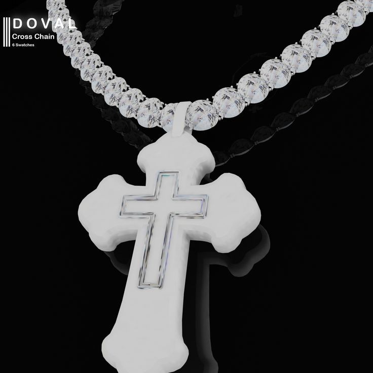 a white cross necklace on a black background