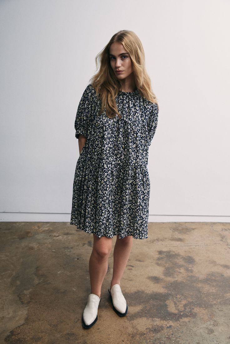 The Theo Dress is an oversized babydoll silhouette with elastic at the sleeve and neck. Floral print adds a pop of color and charm. Loose fit and flowy design in a lightweight seersucker fabric to add a subtle texture to the dress. 100% Japanese Cotton Seersucker Machine was delicate and hang to dry. Flowy Puff Sleeve Midi Dress With Floral Print, Puff Sleeve Dress With Floral Print, Billowy Floral Print Dress With Puff Sleeves, Casual Balloon Sleeve Mini Dress, Floral Print Puff Sleeve Dress For Casual Wear, Casual Floral Dress With Gathered Sleeves For Spring, Casual Spring Floral Dress With Gathered Sleeves, Casual Dress With Billowy Gathered Sleeves, Oversized Puff Sleeve Dress For Fall