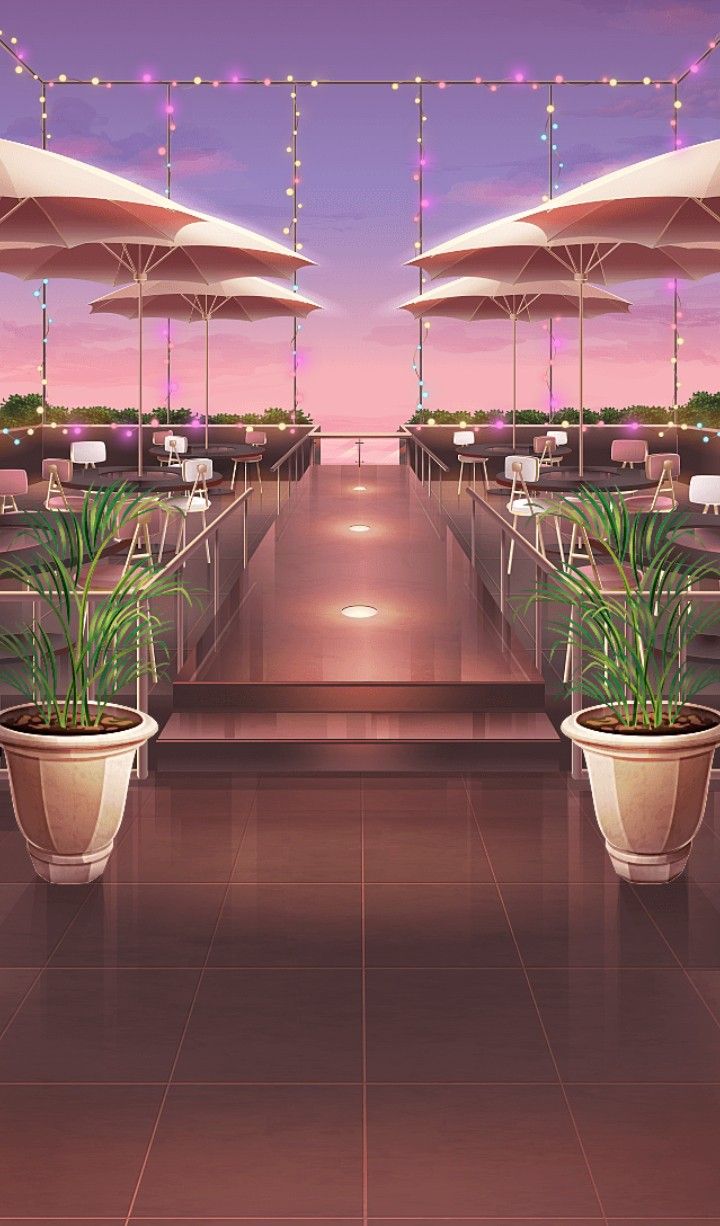 two potted plants sitting on top of each other in front of an outdoor dining area