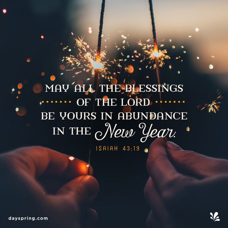 two hands holding sparklers with the words, may all the blessings of the lord be yours in abundance in the new year