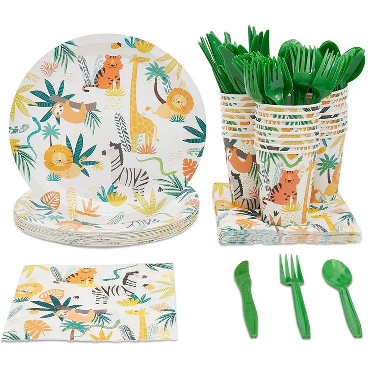 a set of children's dinnerware with green forks, napkins and utensils