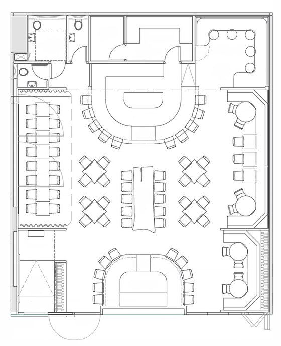 the floor plan for an office with tables and chairs, desks and couches