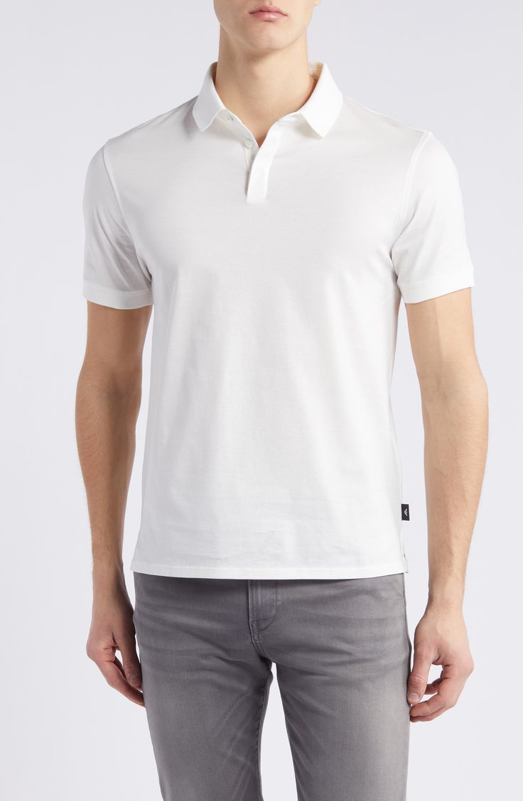 Classic and comfortable, this jersey polo made from soft cotton is always a great choice for everyday and keeps you looking as good as you feel. Button half placket Spread collar Short sleeves 100% cotton Dry clean Imported Classic White Cotton Polo Shirt, White Cotton Polo Shirt With Ribbed Collar, White Polo Shirt With Johnny Collar, White Johnny Collar Polo Shirt, White Johnny Collar Polo Shirt With Placket, White Cotton Polo Shirt With Polo Collar, White Cotton Collared Polo Shirt, White Relaxed Fit Cotton Henley, Classic Cotton Henley For Everyday