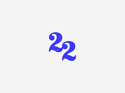 the number twenty two is drawn in blue ink