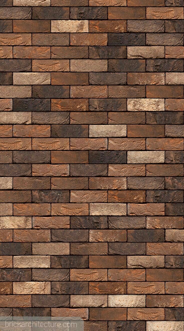 a brown brick wall that is made out of different types of wood planks and bricks