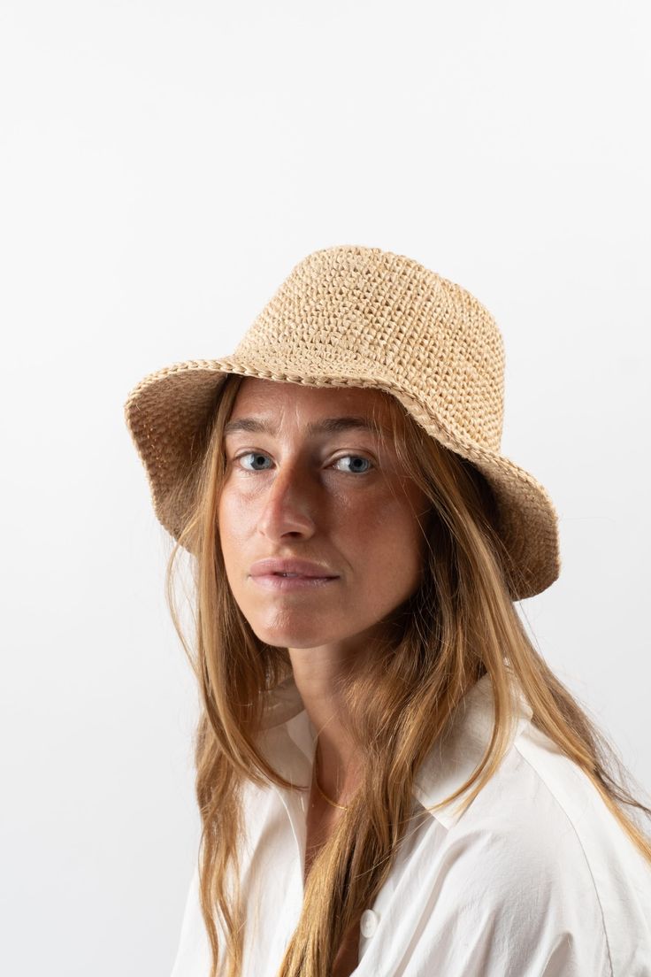 The perfect, minimal vegan bucket hat that will surely become a staple in your wardrobe. Made by hand from naturally-dyed, cabuya plant fiber. A cute, packable hat made by hand and in small batches by our talented women artisan group, this will be your new favorite companion for sunshine-soaked days. Plant Dyed & Crocheted Natural Fiber Moveable 3-4" brim Flexible elastic inner band for the best fit Crocheted Bucket Hat, Packable Hat, Garden Clogs, Crochet Bucket, Crochet Bucket Hat, Knit Outerwear, Plant Dyes, Plant Fibres, Naturally Dyed