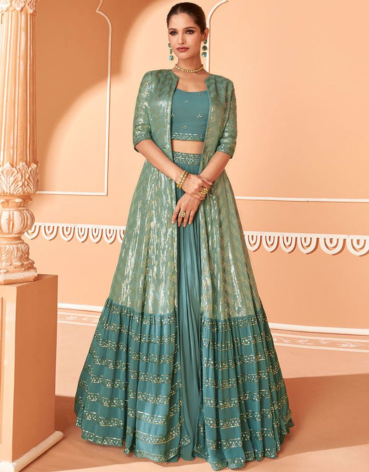 Designer Party Wear Readymade Salwar Kameez Processing Time : 20-25 Working Days Work : Heavy Thread Embroidery With Sequins Work Fabric: Top : Chinon Bottom : Chinon Dupatta : Chinon Color: Top : Turquoise Bottom : Turquoise Dupatta : Turquoise Indo Western Lehenga, Western Lehenga, Modest Evening Dress, Green Lehenga, Utsav Fashion, Party Wear Lehenga, Top Skirt Set, Designer Dresses Casual, Party Wear Indian Dresses