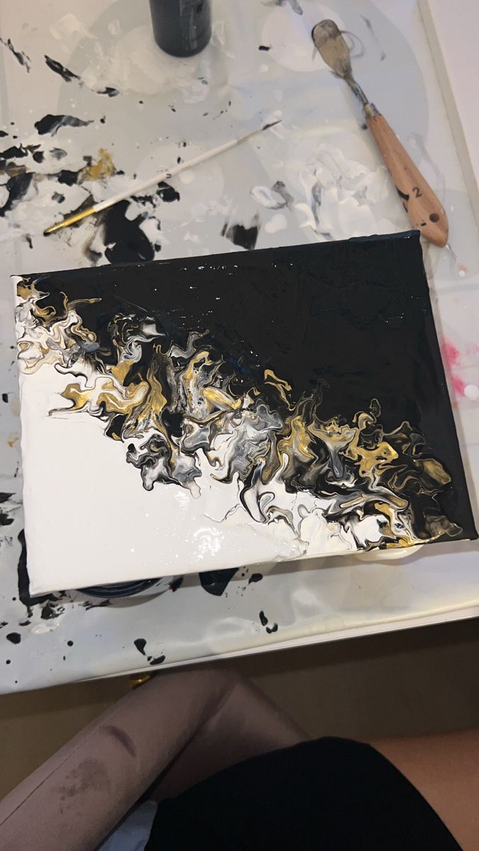 a painting being worked on in an art studio