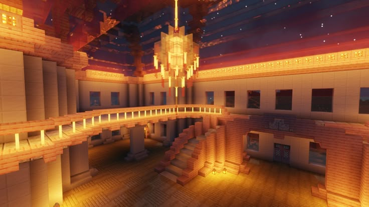 the inside of a building with stairs and chandelier