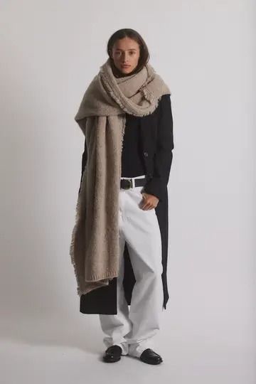 A breathable and super-soft alpaca-blend throw in a perfectly neutral hue. Equal parts warm and weightless, it easily transitions from blanket to scarf. Whether it’s wrapped around shoulders, draped over a lap, styled on a couch, or thrown over a chair, this luxurious layer merges style with functionality both indoors and out. Blanket Dress, Packable Hat, Everyday Handbag, Comfy Blankets, Comfort Blanket, Sun Protection Hat, Raffia Bag, L And Light, Scarf Men